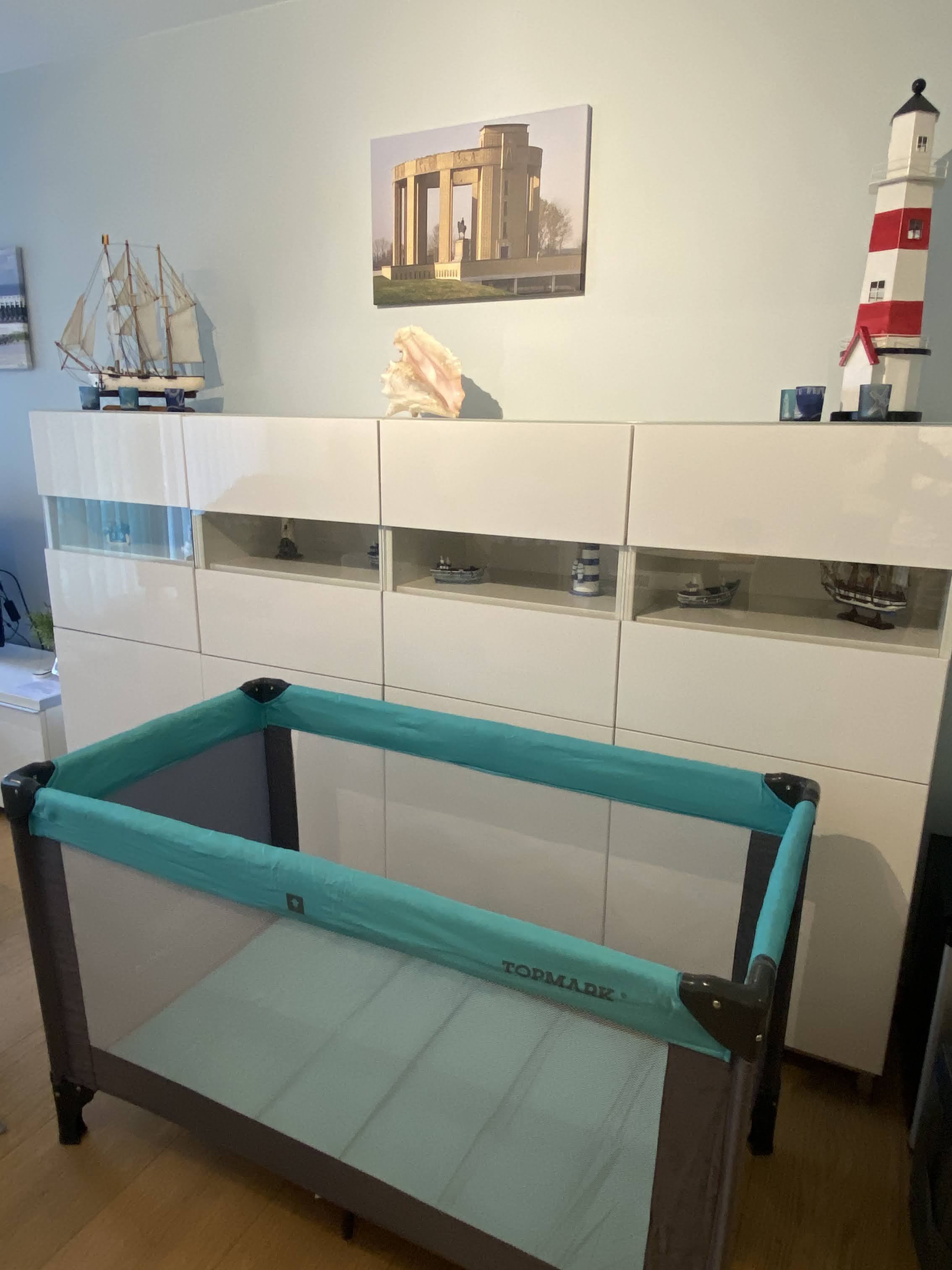 Travel cot for young children in the apartment; it cannot be placed in the bedroom